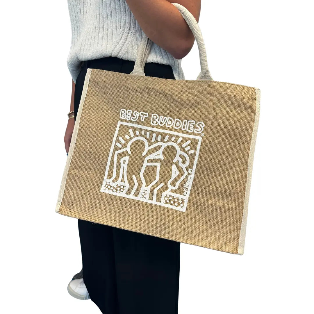 Jute tote bag with white haring Best Buddies logo on one side and "Inclusion" white letters on the other