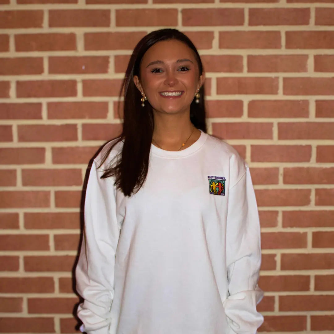 White crewneck sweatshirt with colorful Best Buddies Haring logo on the front