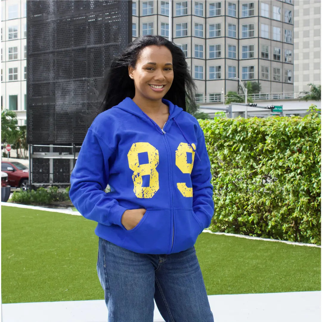 Blue Zip Hoodie with "89" in yellow on the front and "Best Buddies" in yellow going up the back