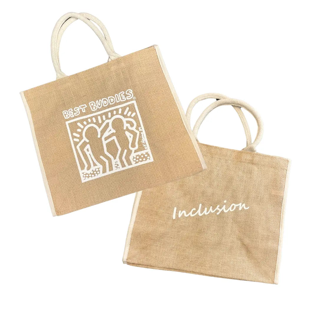 Jute tote bag with white haring Best Buddies logo on one side and "Inclusion" white letters on the other