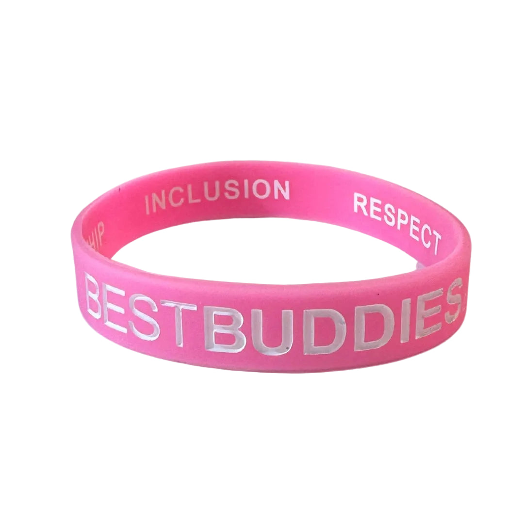Pink bracelet with "best buddies" written on the outside, and "friendship, inclusion, respect, and acceptance" written on the inside