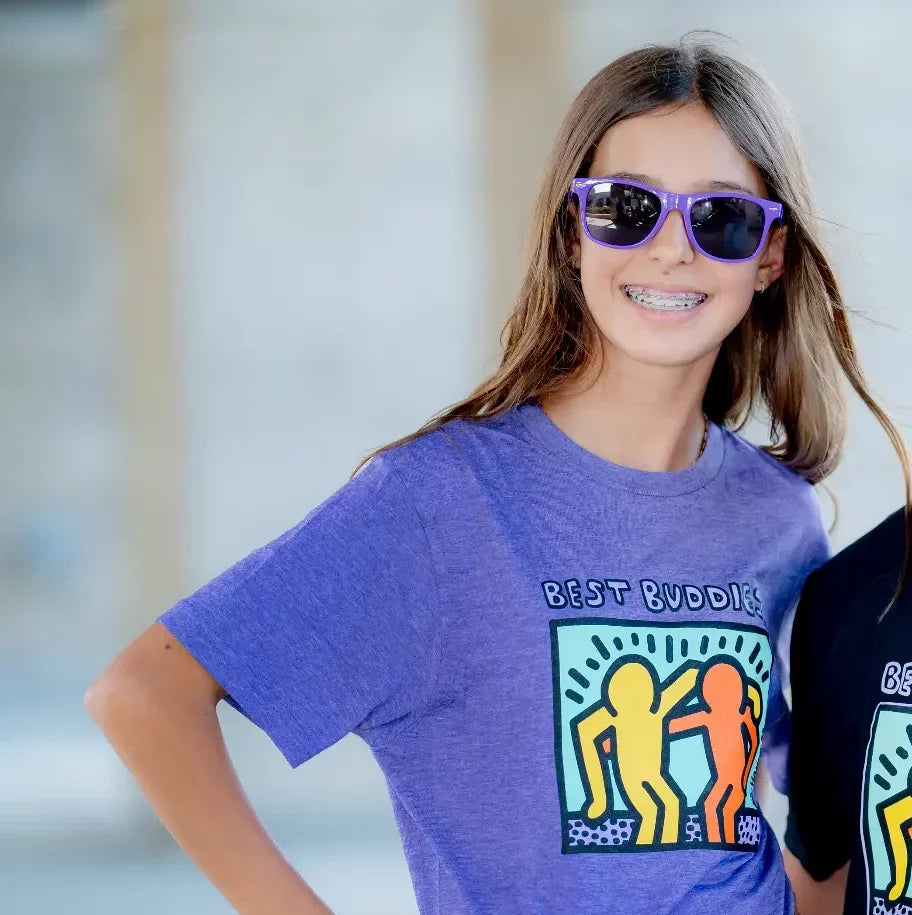 Purple tee shirt with colorful traditional haring Best Buddies logo on the front