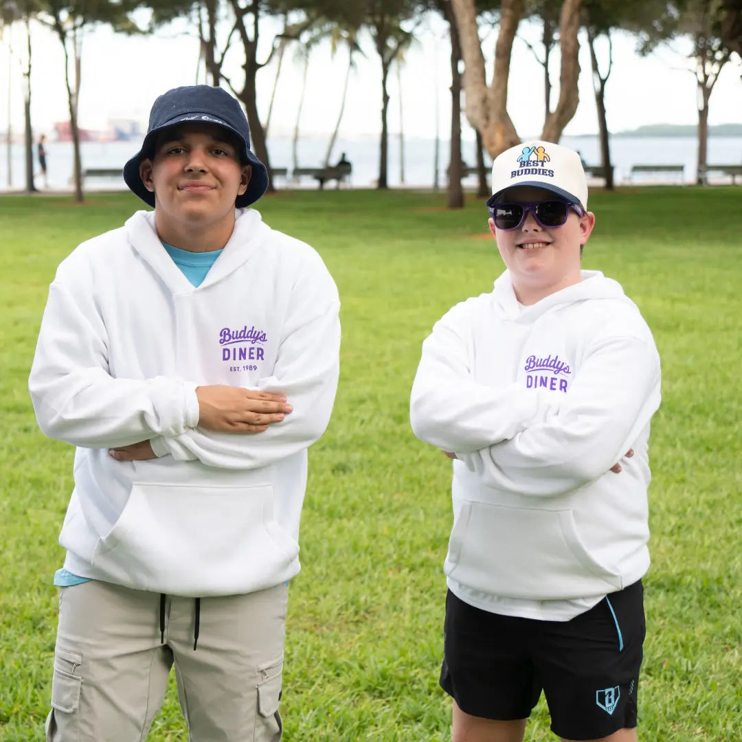 White Best Buddies Hoodie featuring a colorful ‘Buddy's Diner’ graphic with retro diner design on the back.