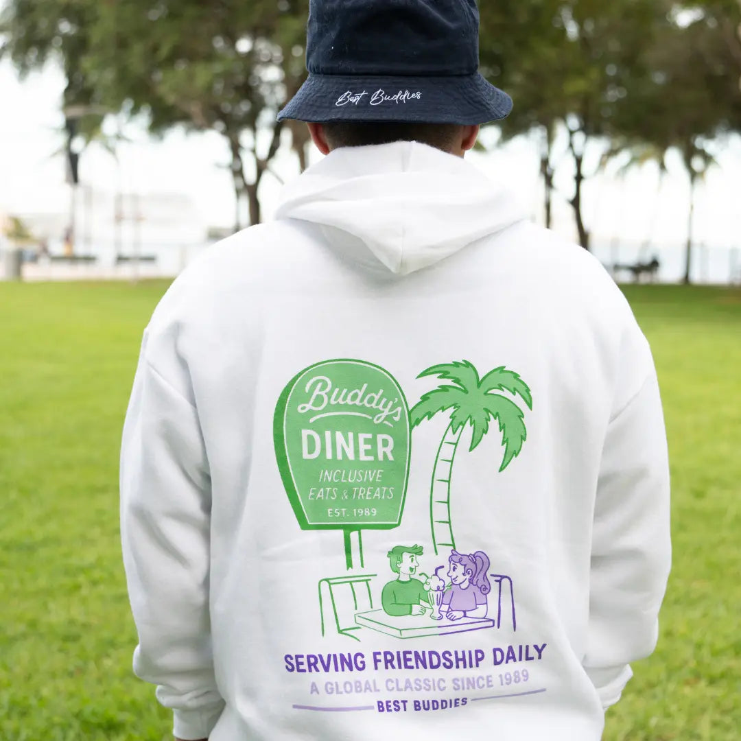 White Best Buddies Hoodie featuring a colorful ‘Buddy's Diner’ graphic with retro diner design on the back.