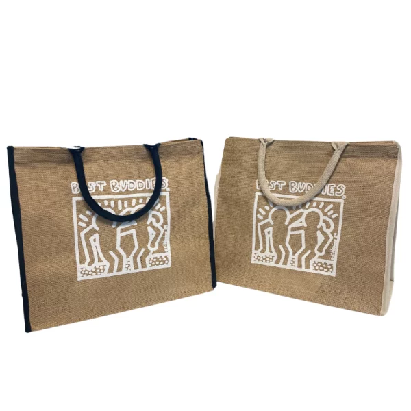 2 large jute totes, one with navy handles, and one with cream handles